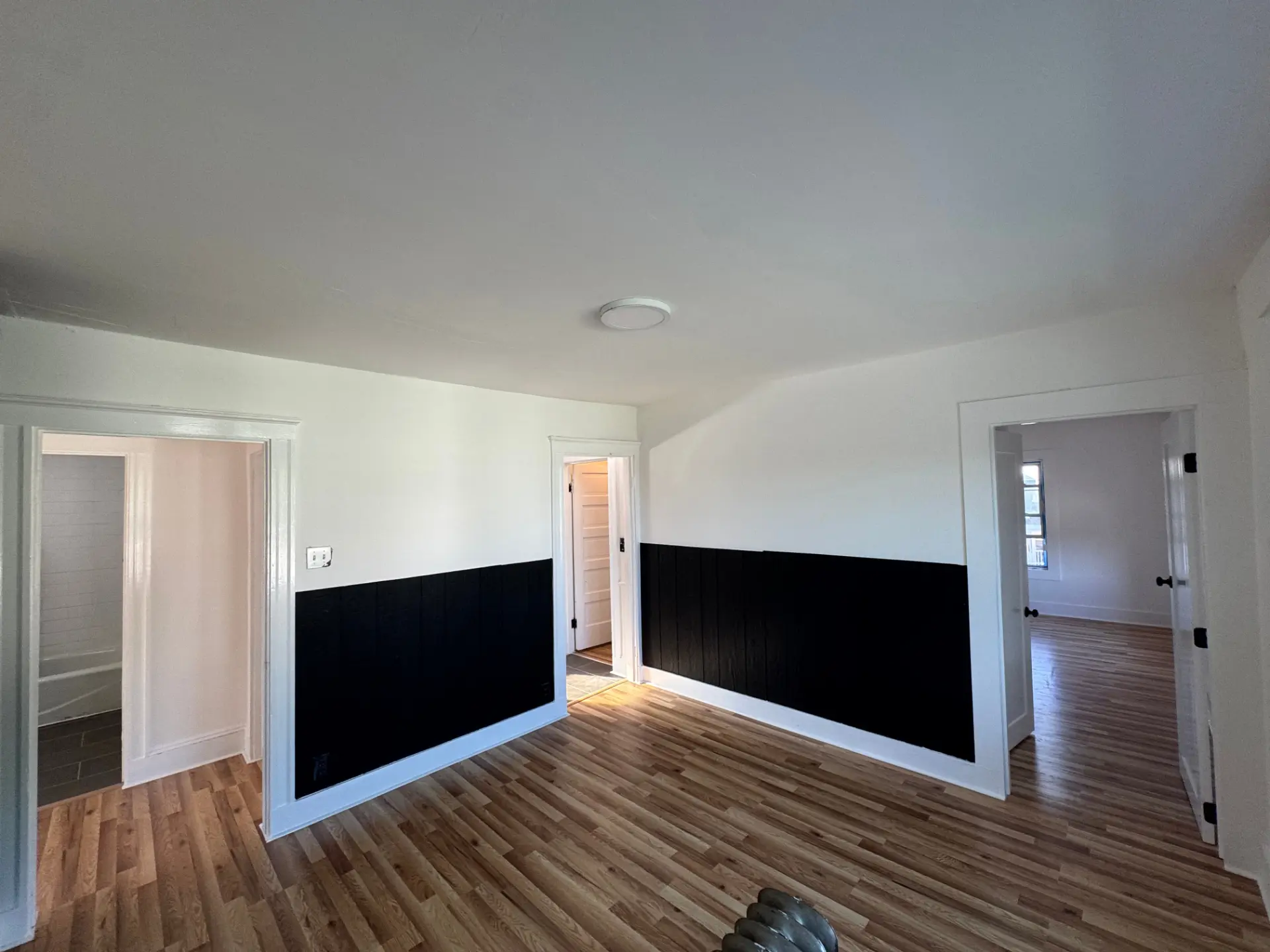 Two-tone walls with dark wainscoting