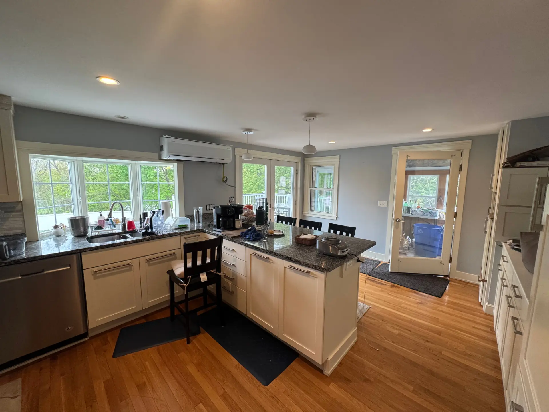 Kitchen refresh in soft gray with crisp white cabinets